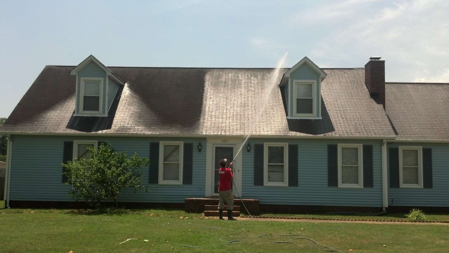 Soft washing a roof