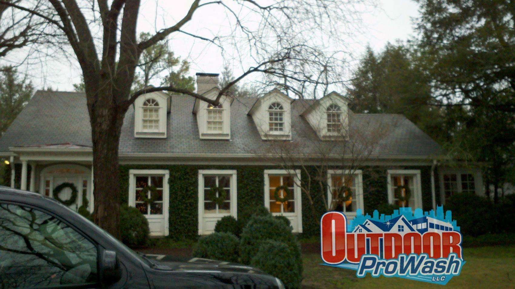 Ivy-covered house, Christmas wreaths.